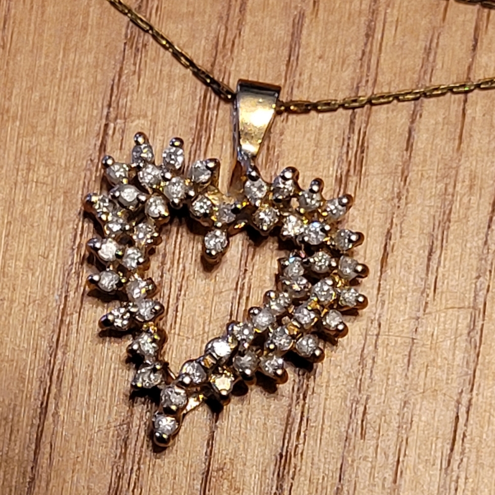 14k solid gold and genuine mined diamond Pendant